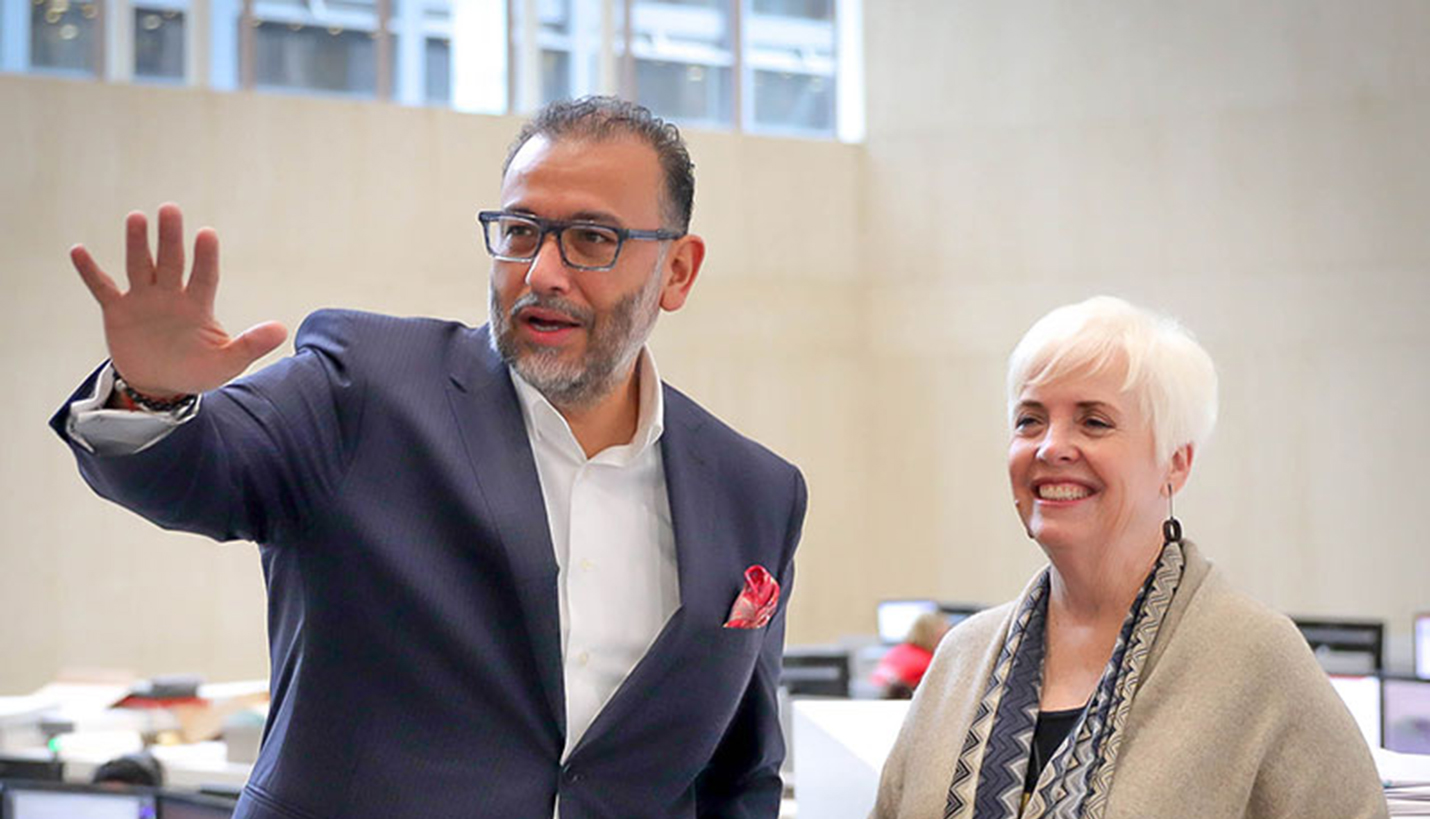 Senior Principal Art Chavez shows Dean of the University of Houston Gerald D. Hines College of Architecture and Design, Patricia Oliver, around the recently remodeled Page office. -