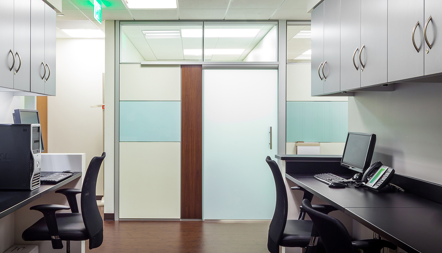 Caregiver workstation at Modern Spine-Sugar Land designed by Page. -