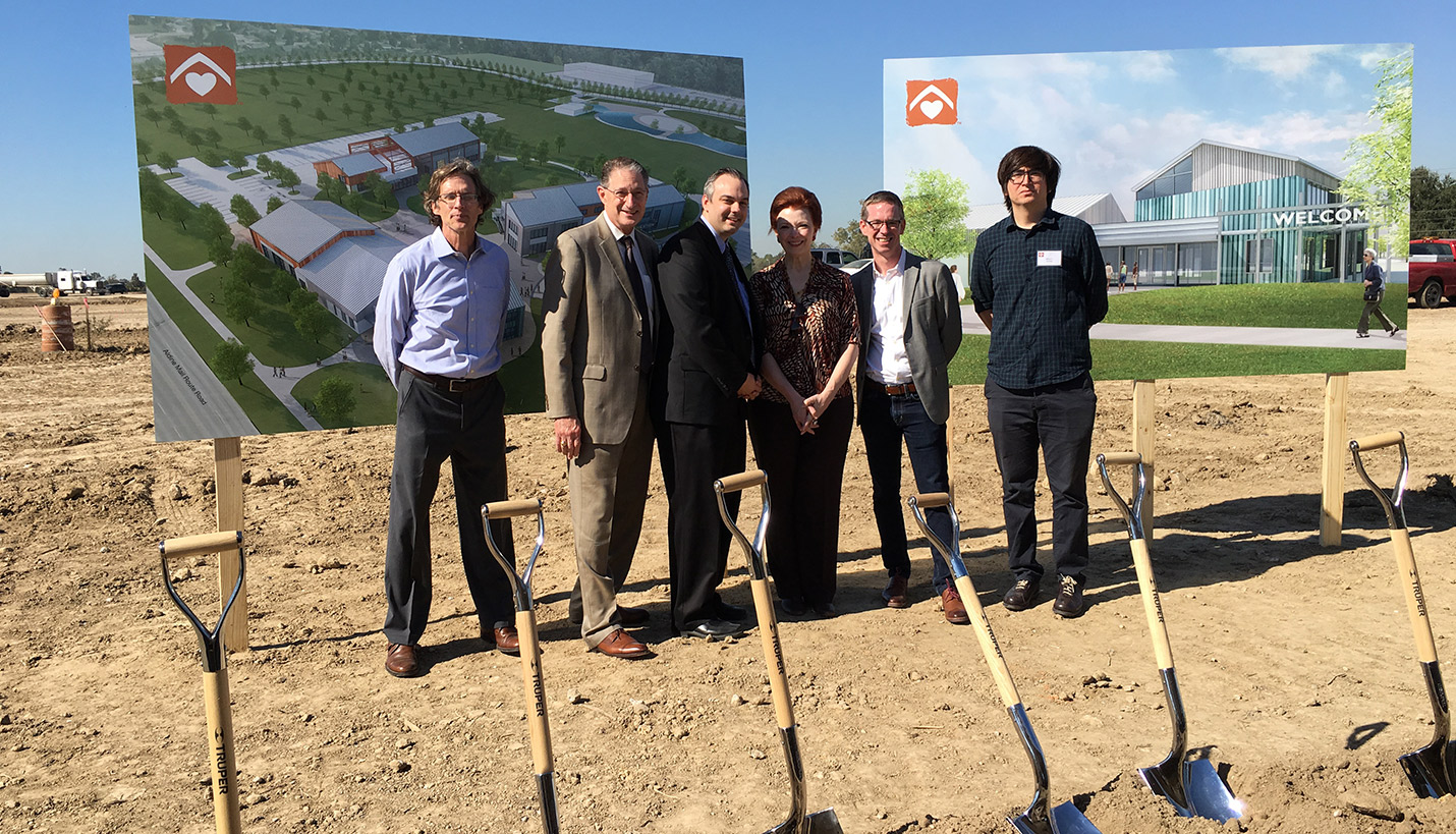 (L-R) Neighborhood Centers Senior Director of Facilities Planning Matt Starr, Page Principal-In-Charge Jeff Bricker, Page Project Manager Justin Winchester, Neighborhood Centers CEO Angela Blanchard, Page Senior Designer David Quenemoen and Page Designer Alberto Govela. -