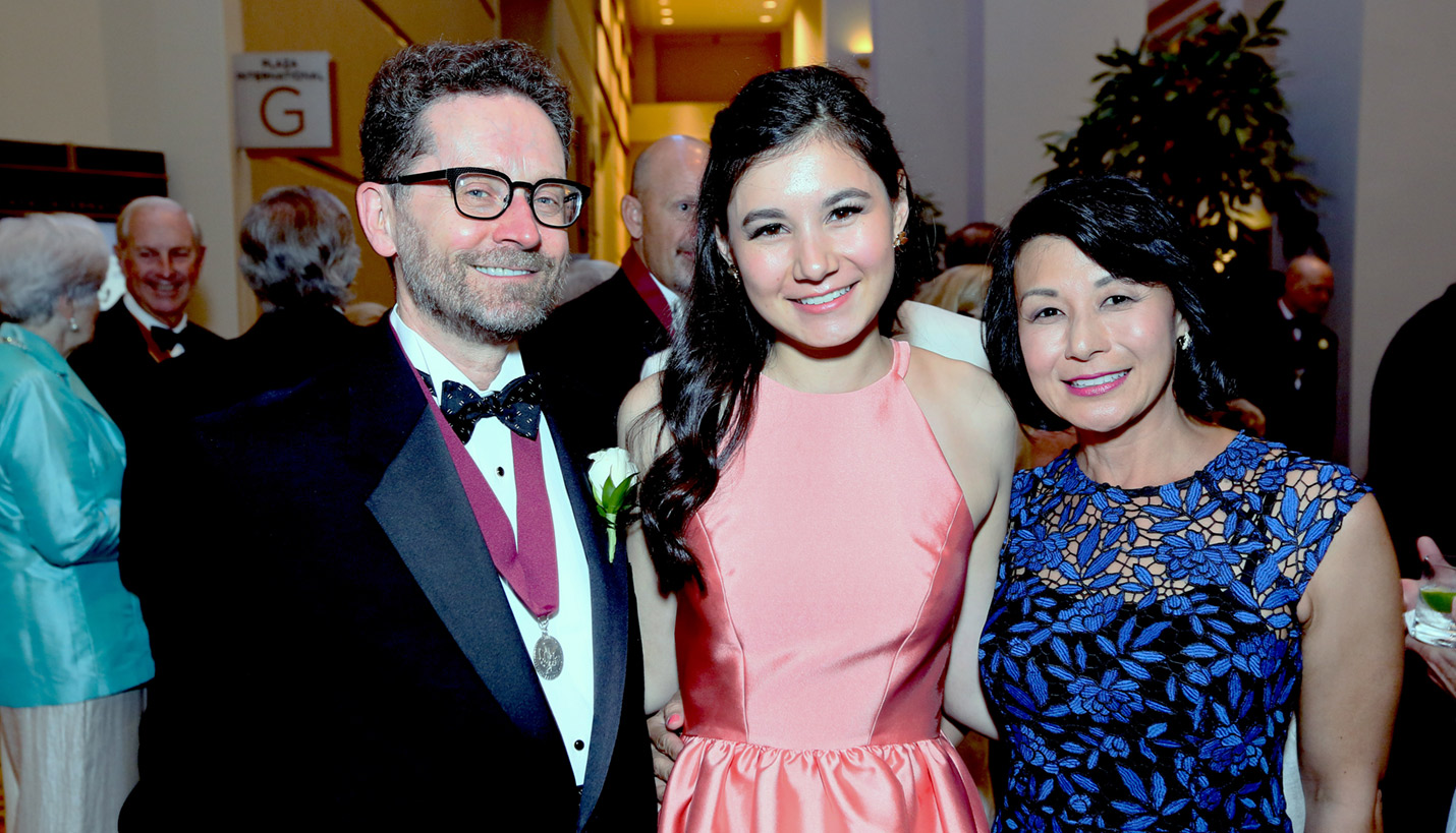 Page Senior Principal James Wright celebrates his investiture into the College of Fellows of the American Institute of Architects with his family. - Oscar & Associates
